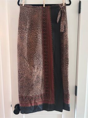 1980s 100% silk leopard maxi wrap skirt with paisley border. Runs small
